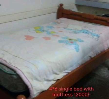 Bed with mattress image 1