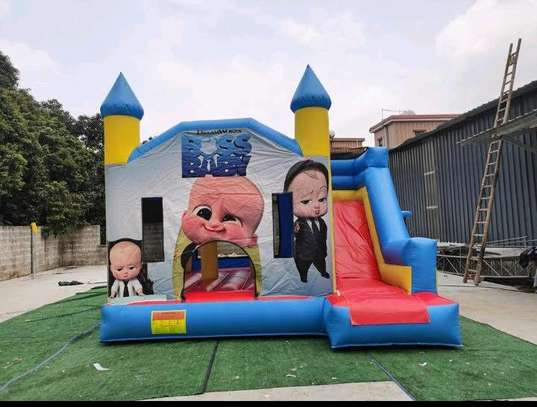 Boys' bouncing castles available for hire image 3
