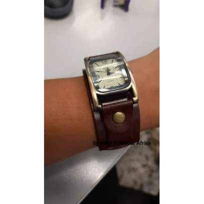 Womens Brown Leather watch and silver earrings image 2