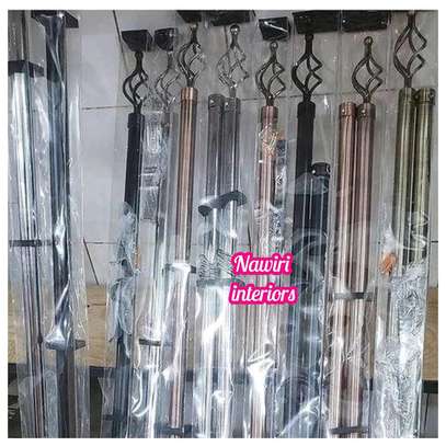 Extendable hone curtain rods image 1