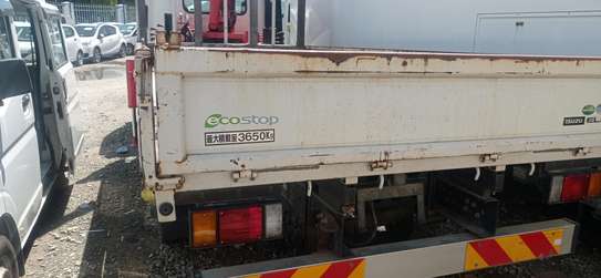 ISUZU ELF WITH CRANE AND FRONT LEAF SPRINGS image 4