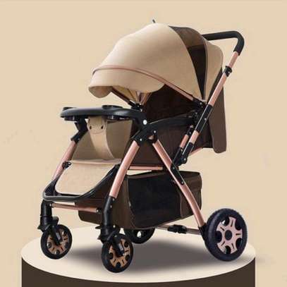 Foldable baby stroller with reversible hanldes image 2