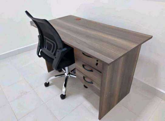 Ergonomic home office chair and a desk image 1