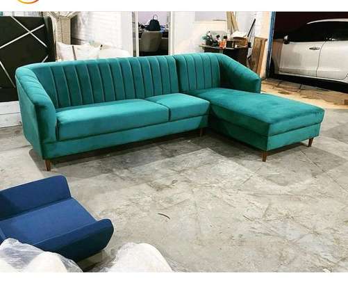 L shaped Tufted sofa image 1
