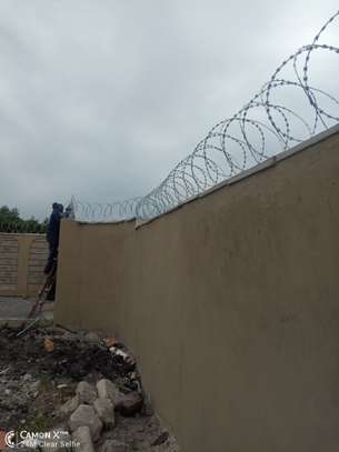 wall top electric fencing installation in kenya image 7