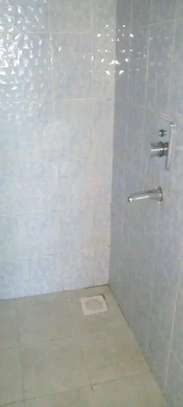 Compact Shower Cabin with Tiled Walls & Faucet image 6