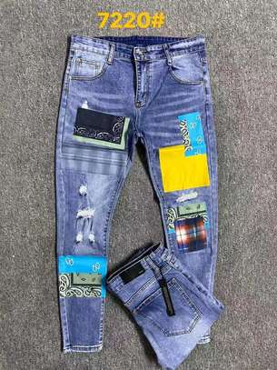 Blue designer jeans image 1