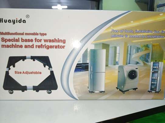 Adjustable washing machine and refrigerator trolley stand image 1