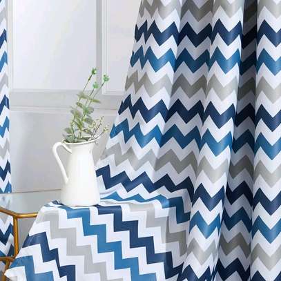 :PLAIN BLUE AND PRINTED CURTAINS image 10
