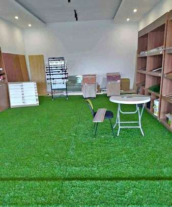 Quality artificial green grass carpet. image 1