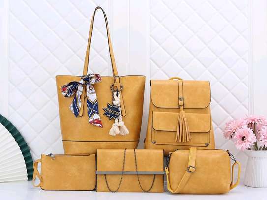 Yellow 4 in 1 classy handbags image 1