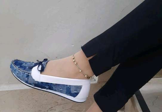 White and blue quality slip ons image 1