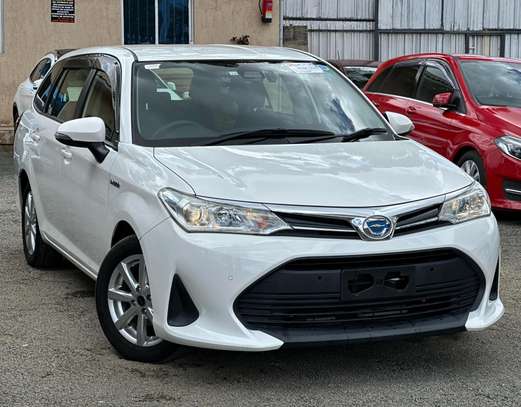 Toyota Fielder hybrid 1500cc white color 2018 model. image 8