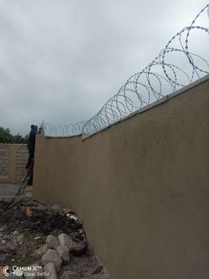 wall top electric fencing installation in kenya image 14