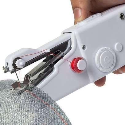 Handy Stitch Portable Hand Held Electric Sewing Machine- Can Be Used By Beginners image 1