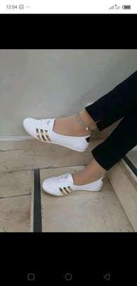 Gold and white quality slip ons image 1