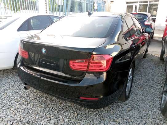 Black BMW 320i image 1