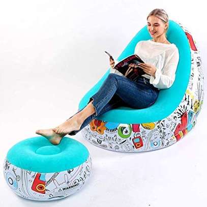 Portable inflatable seat with foot rest and manual pump image 1