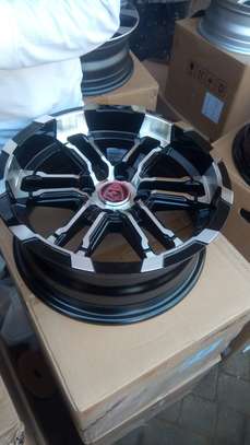 Toyota Vitz offset 14 inch alloy rims in silver grey image 1