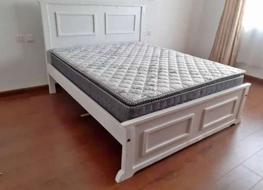 Quality 5*6 hard wood bed. image 1