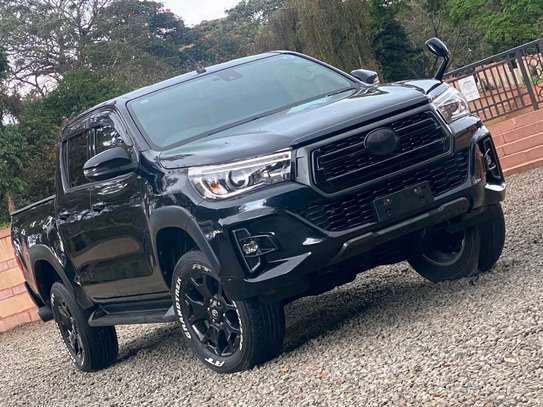 Toyota Hilux black color fully loaded 2019 model. image 11