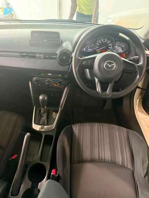 Mazda Demio sedan white image 6