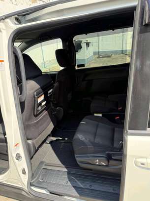 White Minivan with Modern Grille & Roomy Interior  2019 image 5