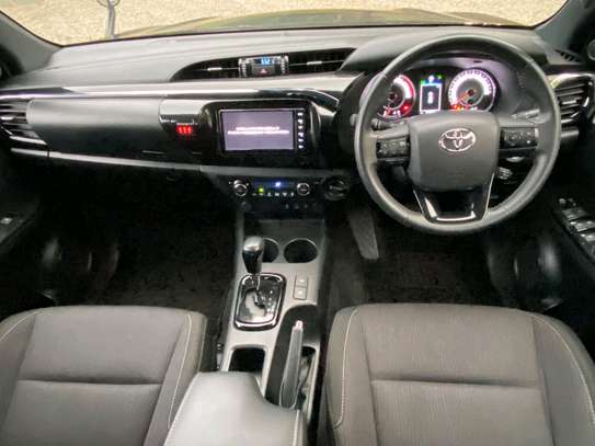 Toyota Hilux black color fully loaded 2019 model. image 12