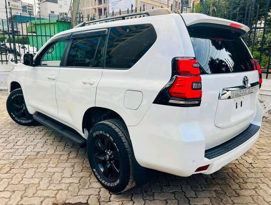 Make Toyota Land cruiser Prado TX white color 2019 model. image 3