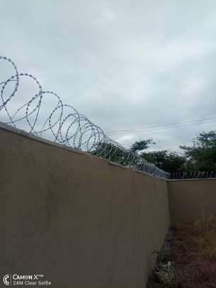 wall top electric fencing installation in kenya image 9