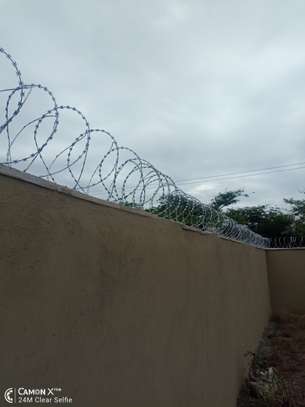 wall top electric fencing installation in kenya image 12