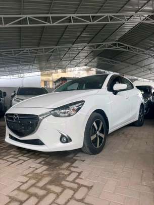 Mazda Demio sedan white image 3