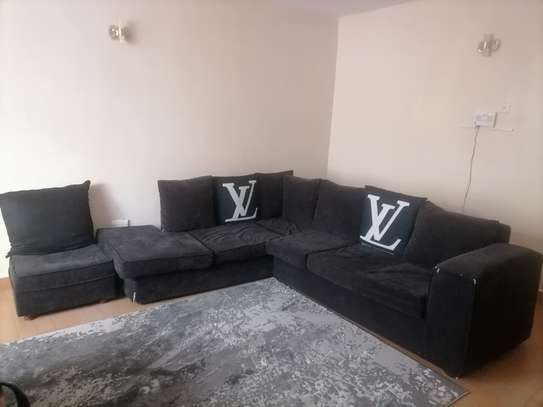 7 seater corner sofa with a matching Pouf. image 4