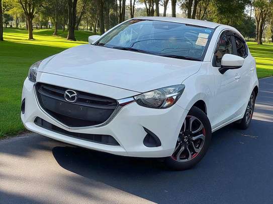 Mazda Demio 
Year 2019
Model fully loaded white color. image 3
