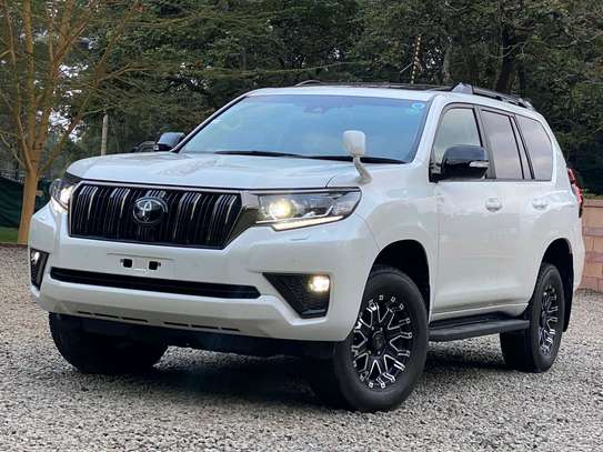 Toyota Land cruiser prodo TXL white color 2021 model. image 9