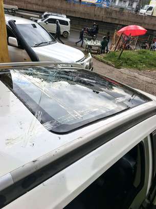 Sunroof glass replacement image 8