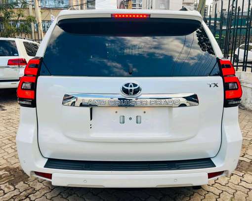 Make Toyota Land cruiser Prado TX white color 2019 model. image 2