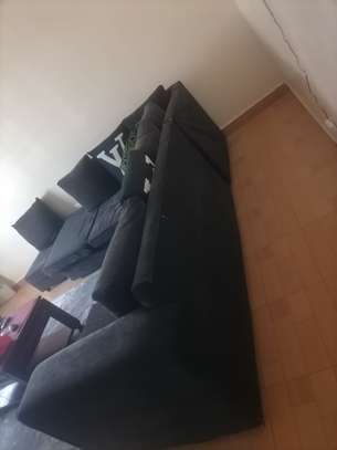 7 seater corner sofa with a matching Pouf. image 3