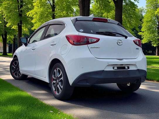 Mazda Demio 
Year 2019
Model fully loaded white color. image 5