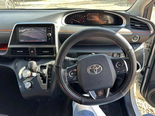 Toyota Sienta perl white color fully loaded 2019 model. image 6