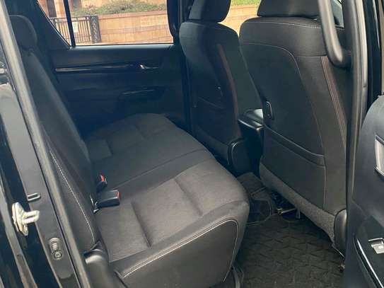 Toyota Hilux black color fully loaded 2019 model. image 10