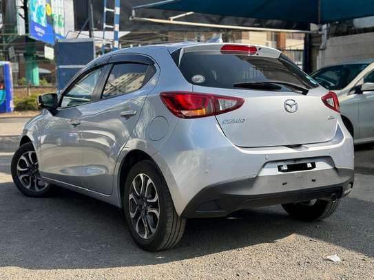 Mazda Demio silver color fully loaded 2019 model. image 11