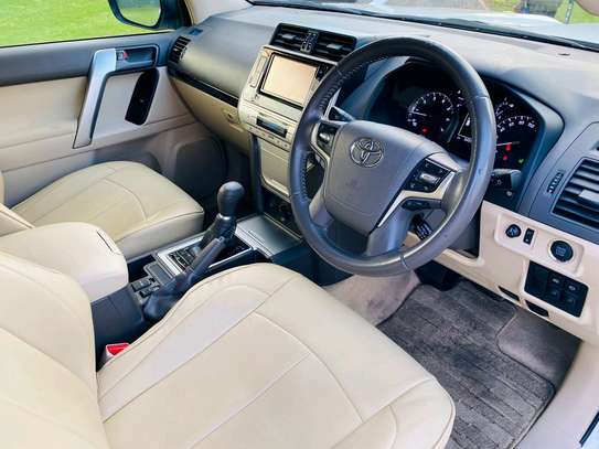 Toyota Land cruiser prodo TXL white color fully loaded image 3