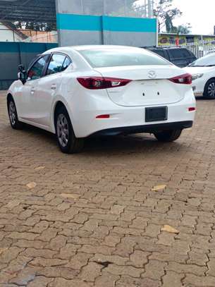 Mazda Axela white color Sedan 2019 model. image 4
