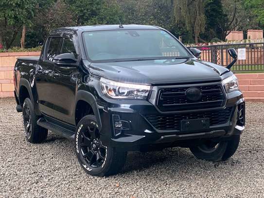 Toyota Hilux black color fully loaded 2019 model. image 8