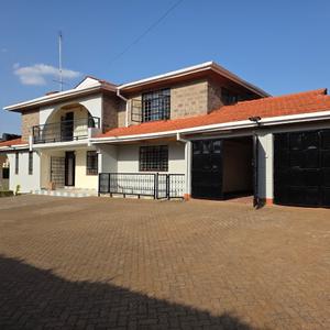 Nestled in the prestigious and serene neighborhood of Runda, this elegant 5-bedroom unfurnished family home offers generous living spaces, exceptional finishes, and a secure environment, making it an ideal residence for families and diplomats.

The home features a welcoming entrance with a guest cloakroom, a spacious living room with a cozy fireplace, and a private balcony overlooking the beautifully landscaped garden. A separate dining area provides the perfect setting for family meals and entertaining guests.

The well-designed kitchen is complemented by a spacious pantry and a separate laundry area for added convenience. A comfortable TV/family room offers additional living space, while the expansive master bedroom serves as a luxurious retreat with ample wardrobe space and an en-suite bathroom. The house boasts high-quality finishes throughout, with a tasteful blend of wooden and tiled flooring.

For enhanced security and peace of mind, the property includes a safe haven and benefits from UN-approved security standards, complete with an all-round electric fence.

Additional features include:

5 spacious bedrooms
Guest cloakroom
Spacious living room with fireplace
Balcony overlooking the landscaped garden
Separate dining area
Modern kitchen with pantry
Laundry area
TV/family room
Expansive master bedroom with en-suite bathroom
High-quality wooden and tiled flooring
Safe haven
Detached 2-bedroom servant quarters
Lockable garage for two cars
Ample parking within the compound
Beautiful, mature landscaped garden
Perimeter electric fence
UN-approved security

This exceptional home combines comfort, elegance, and top-tier security in one of Nairobi's most sought-after residential addresses, offering an outstanding living experience for discerning tenants.