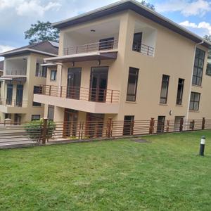 Its a precious and lustrous town house 5bedroom all ensuite with a staff quarters for one.
located in Lavington in a serene environs ,secure and good neighbor hood.
it offers a new concept of home living within the area.
it is blend of modern characterized by the latest design and finishes
it has the following numerous features
sunken lounge with a fire place
separate dining room
wooden flooring except the wet areas that contains ceramic tiles
has large windows to maximize natural light and air circulation
modern kitchen with  oil extractor, pantry and open to the dhobi area.
each bedroom has high quality inbuilt wardrobe, cubicle shower, bath tub and balcony
master bedroom has jacuzzi, shower and walk in closet
family room is upstairs
internet connected, alarm system installed and UN approved zone
with mature garden well manicured
Nairobi city water
solar panel
in gated community of   6 units
ample parking for 4 cars
perimeter wall round with an electric fence .
close to proximity high end schools like Nairobi international school, St Austins, Jaffery , Brae side and Brae burn
close to proximity shopping malls like Lavington Mall, Valley Arcade and Yaya centre