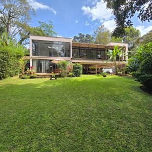 SEMI FURNISHED 3-BEDROOM HOUSE FOR RENT IN MUTHAIGA WITH PRIVATE GARDEN, PARKING AND VIEWS OF KARURA FOREST.

Description.

RENT : $3,800 USD PER MONTH.

• Fantastic two-storey three-bedroomed architect designed garden house. Approx. 3,000 sq.ft. (278m²), with high-end finishes throughout * Spacious living, dining and modern open plan fully equipped Italian kitchen with German and Italian * Family / tv room * Spacious master bedroom with built-in wardrobes and en suite bathroom. * Spacious bedroom 2 with built-in wardrobes and separate bathroom * Bedroom 3 / Study with built-in wardrobes and shared bathroom * Utility room with sink and washing machine
om, Master Bedroom
• Guest cloakroom & wc.