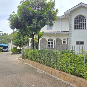Full of character and with only few in a compound is this Charming 5 bedroom townhouse in Lavington. It features 2 floor levels, a small  garden and separate staff quarters section. The townhouse has a living room with a fireplace, formal dining area, large fitted kitchen, safe haven, family room and office. The townhouse features excellent security as it is part of a gated community, guards are on site 24/7 and there is a safe haven. Also, there is a solar inverter full backup generator for the compound.

Features
Ground Floor
Entry lobby
Living room with a fire place
Verandah with mature creepers and greenery
Fitted kitchen with cabinets, an island, electric hob and oven.
Dining area
Utility area
Guest bedroom that is en-suite and has wardrobes.
Common cloakroom
Staff quarters that are en-suite and have separate entrance
Garden that is mature and private
Parking
First Floor
Family room
3 Bedrooms that are en-suite with wardrobes. The master bedroom has a balcony overlooking the garden
Second Floor
1 Bedroom that is en-suite and has wardrobes.
Office/Study
Amenities
Security
Solar Inverter for power backup