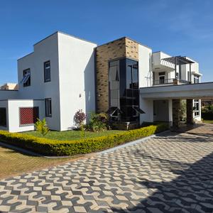Experience luxury living in this exquisite 4-bedroom standalone villa in the prestigious Tatu City. Set on a spacious ½-acre private compound, the home features a dedicated office and a backup generator offering exceptional comfort, privacy, and exclusivity.

Key Features:

* An elegant entry foyer that creates a warm and inviting first impression.
* Beautifully well-lit double-volume lounge opening seamlessly onto the lush garden.
* Separate dining area thoughtfully positioned to face the kitchen, creating a seamless flow for dining and entertaining.
* Fully fitted semi open-plan kitchen complemented by a separate dirty kitchen, offering both style and practicality.
* Dedicated laundry area designed for convenience and efficient household functionality.
* Spacious and well-appointed guest bedroom.
* Stylishly appointed visitors cloakroom.
* A spacious family room opening onto a private balcony.
* All bedrooms are thoughtfully designed with private en-suite bathrooms, offering comfort, privacy, and convenience.
* Dedicated Office/Study Area.
* A dedicated DSQ with accommodation for two domestic staff, offering comfort, privacy, and convenience.
* A dedicated DSQ with accommodation for two domestic staff.
* Beautifully manicured garden.
* Neatly cabro-paved driveway providing a welcoming approach to the property.
* Apple parking space .
* 24/7 CCTV surveillance ensuring enhanced security and peace of mind.

Rent : Kes 400,000/-

Kindly reach us on:
Call/SMS/WhatsApp +254750330033
Email:sales@ultraproperties.co.ke